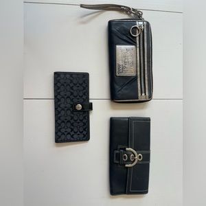 Lot of Authentic Coach wallets and check book cover.